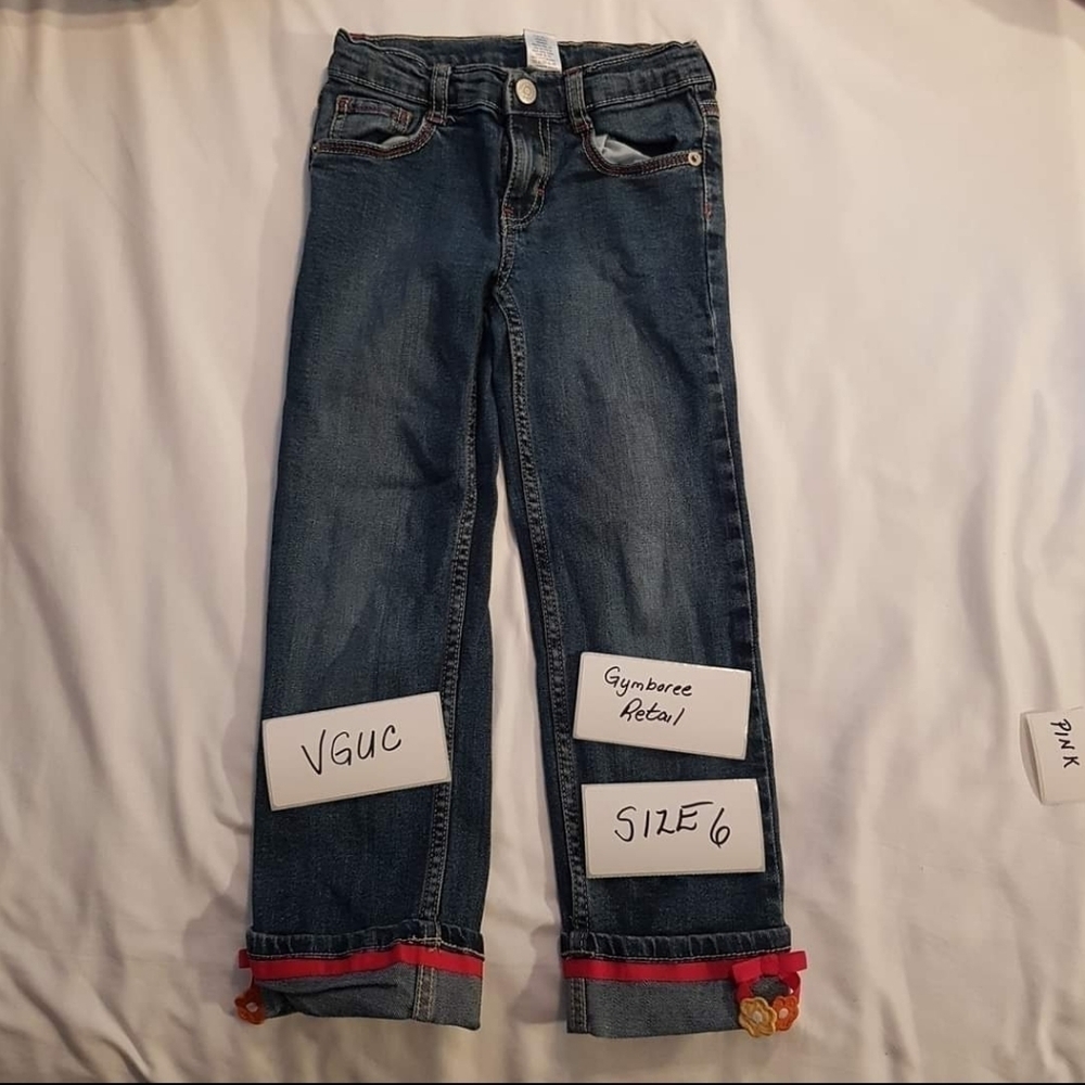 Gymboree jeans with  flowers on the bottom size 6